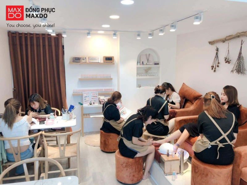 Đồng phục tạp dề nail giúp tạo dựng hình ảnh đồng nhất và chuyên nghiệp cho nhân viên (nguồn: Internet) 